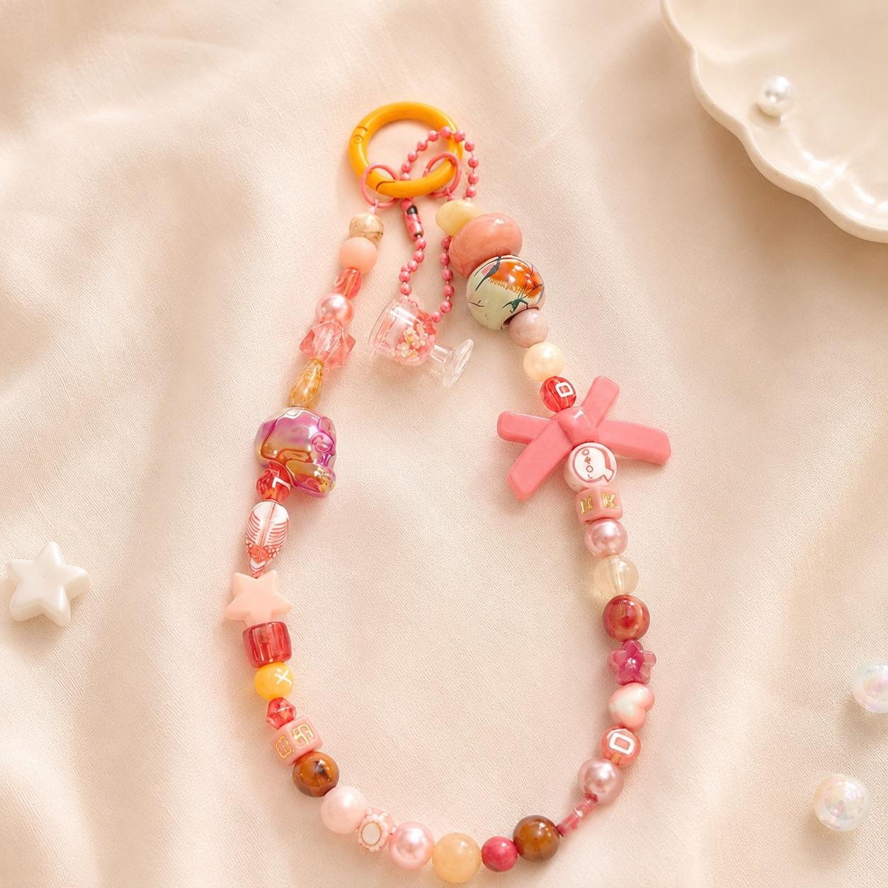 Attache téléphone Kawaii corail avec perles lettres et nœud rose