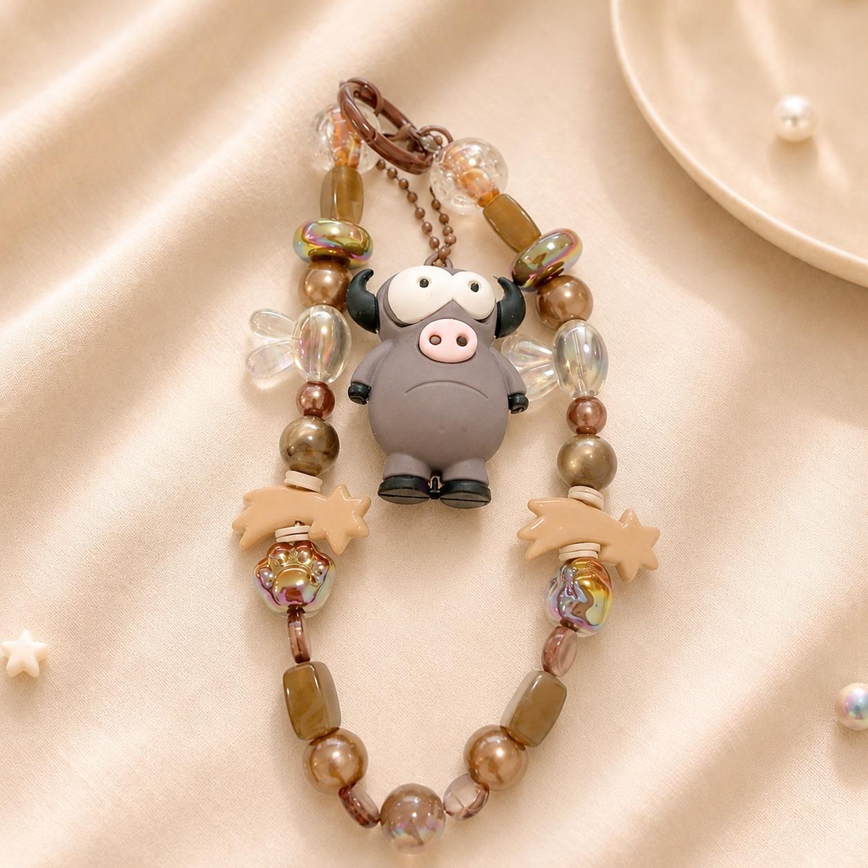 Porte-clé Kawaii marron avec figurine taureau rigolo